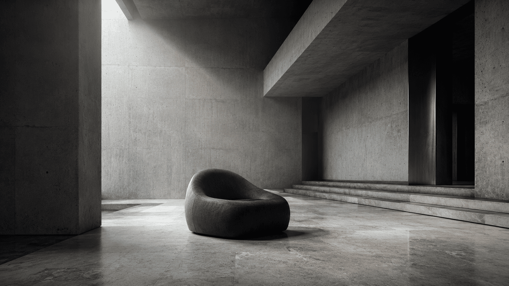 Intérieur minimaliste en béton, fauteuil sculptural éclairé par une verrière zénithale